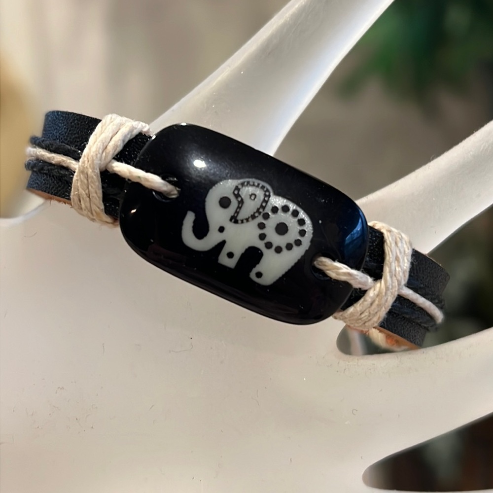 Leather Rope Tribal Elephant Bracelet. Unisex, expands to fit most wrists. Black